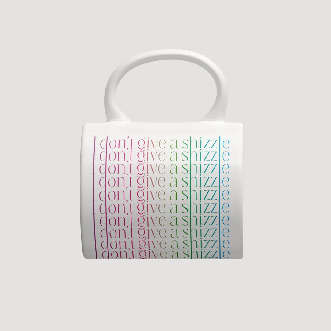 I don’t give a shizzle Tasse mit bunter Schrift von oben, jede Zeile gut lesbar