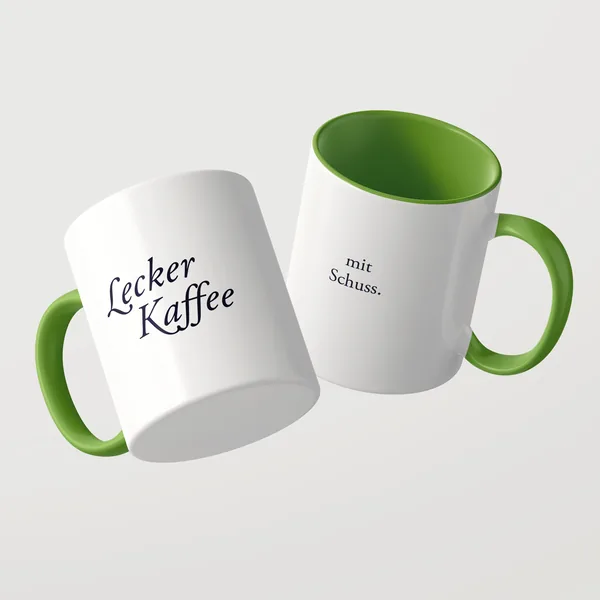 Lecker Kaffee Tasse mit grüner Innenseite und grünem Henkel