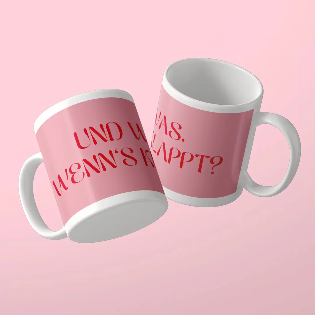 Zwei rosa Tassen mit dem roten Spruch Und was, wenn’s klappt?, Mutmacher-Tasse von Studio SaySay