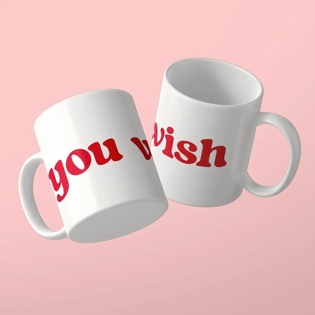 Zwei weiße Tassen mit dem roten Schriftzug you wish, freche Tasse von Studio SaySay